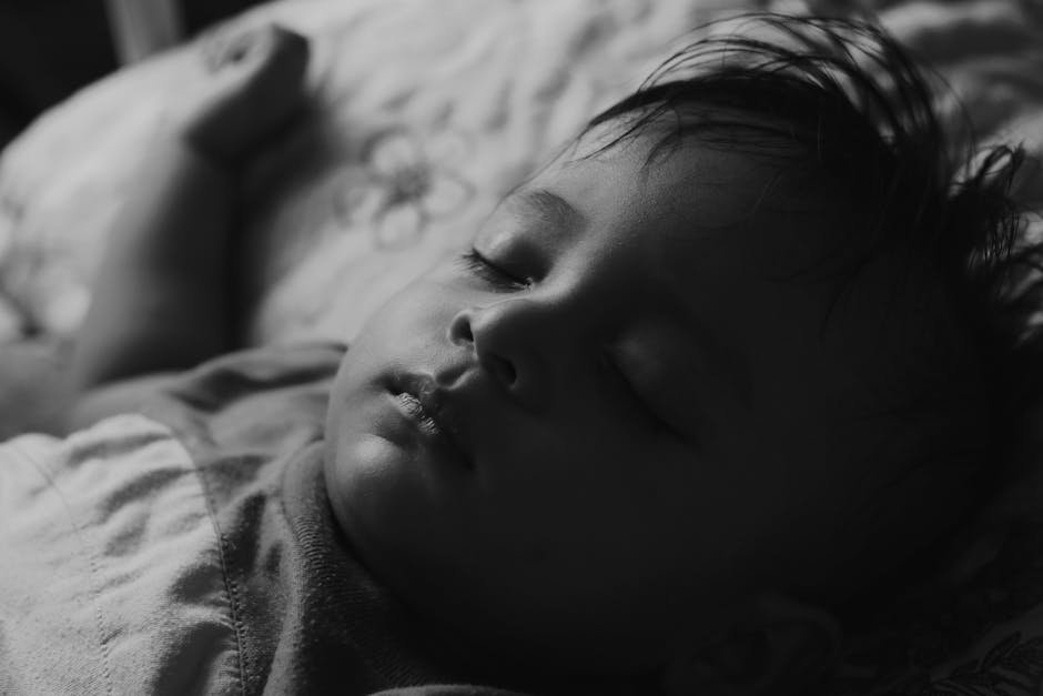Kind slaapt rustig in bed
